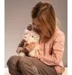 Jeune fille jouant avec peluche Disney Originals Marie signée Steiff