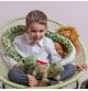 Enfant jouant avec Peluche serpent vert - 175 cm signée Teddy Hermann